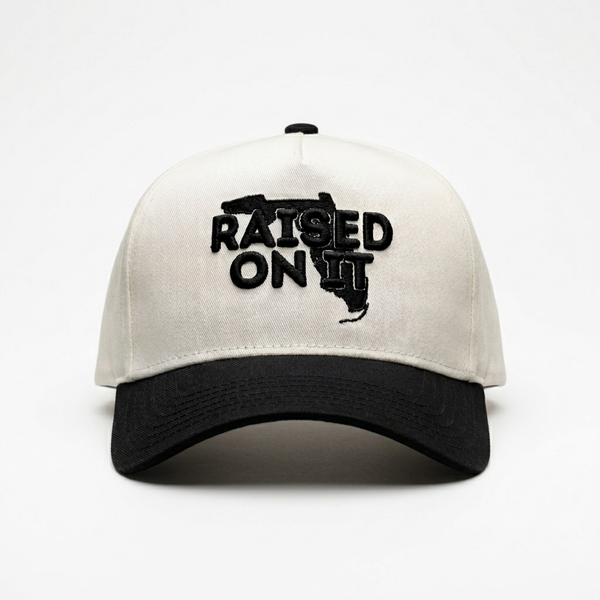 Raised On It | Florida Logo | Embroidered Trucker Hat — White/Black