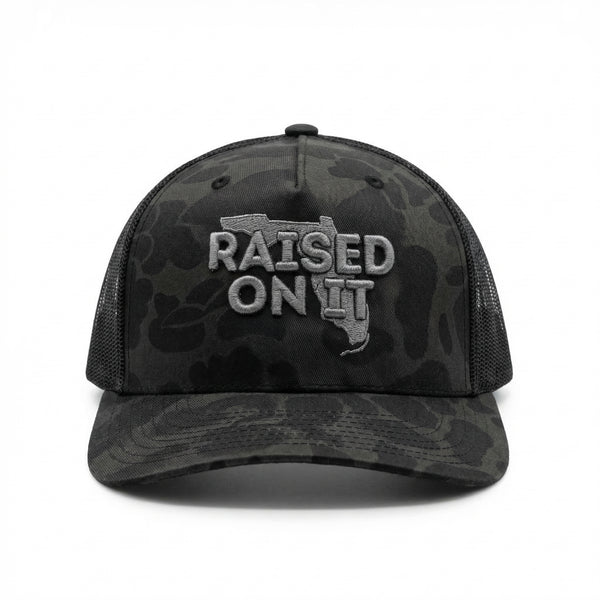 Raised On It | Florida Logo | Embroidered Trucker Hat — Silver Camo