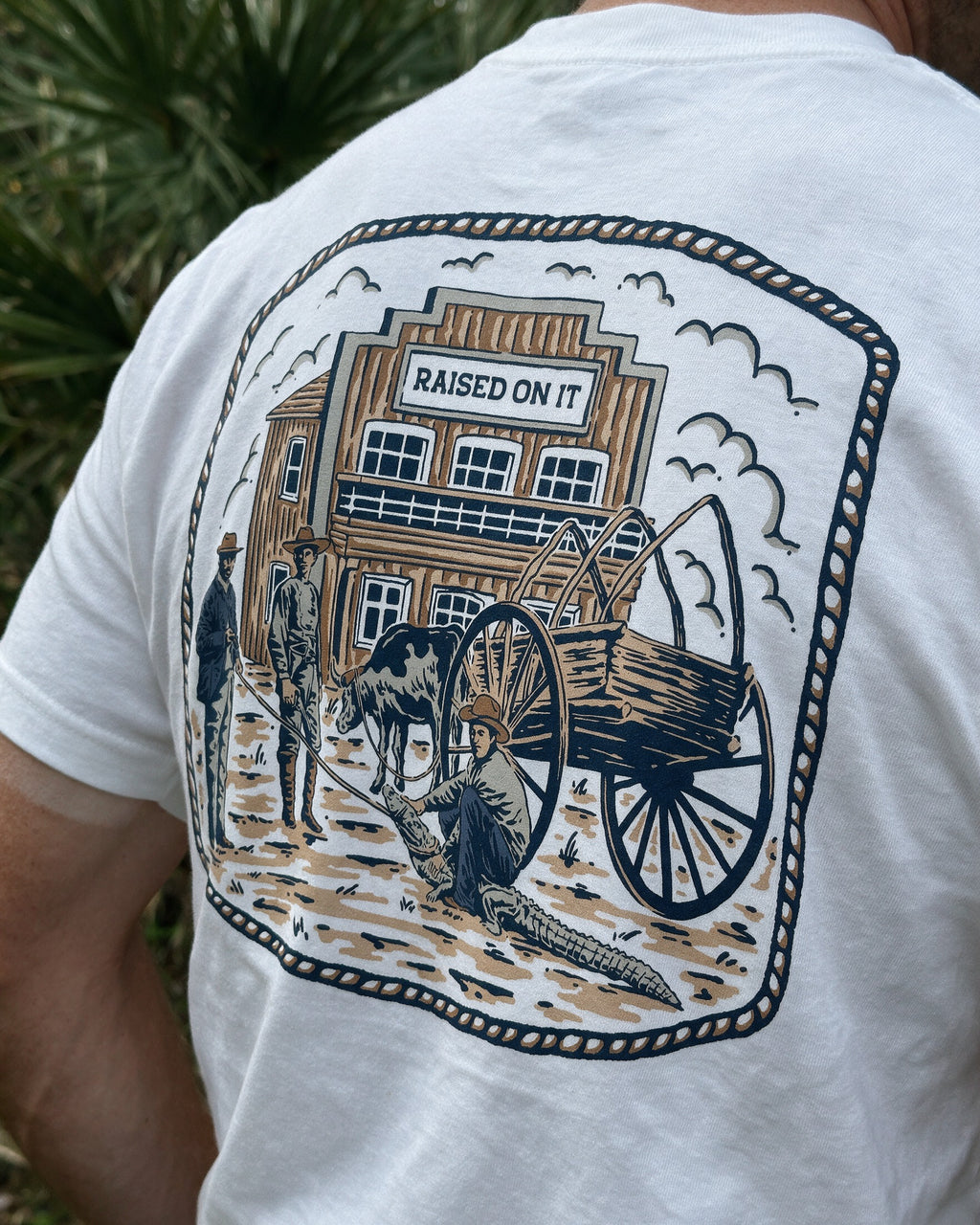 Close-up of the Florida Cowboy tee back print on white cotton